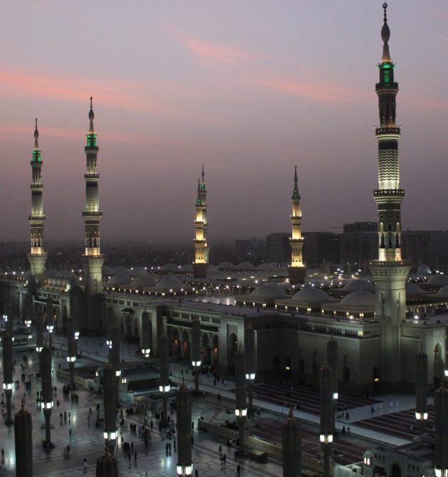 The moon between two towers of the Prophet's Mosque in Al Madinah, Saudi Arabia